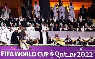 epa10316094 Sheikh Tamim bin Hamad Al Thani (C), the Emir of Qatar, speaks during the Opening Ceremony prior to the FIFA World Cup 2022 group A Opening Match between Qatar and Ecuador at Al Bayt Stadium in Al Khor, Qatar, 20 November 2022.  EPA/Tolga Bozoglu
