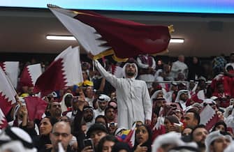 epa10316005 Supporters of Qatar prior the FIFA World Cup 2022 group A Opening Match between Qatar and Ecuador at Al Bayt Stadium in Al Khor, Qatar, 20 November 2022.  EPA/Noushad Thekkayil
