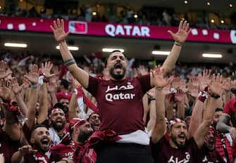 epa10316185 Supporters of Qatar prior to the FIFA World Cup 2022 group A Opening Match between Qatar and Ecuador at Al Bayt Stadium in Al Khor, Qatar, 20 November 2022.  EPA/Friedemann Vogel