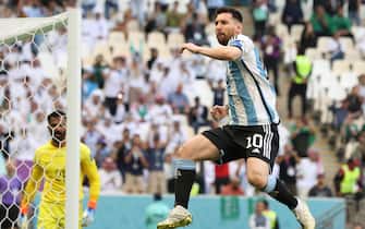 epa10319739 Lionel Messi of Argentina celebrates after scoring the 1-0 penalty goal in the FIFA World Cup 2022 group C soccer match between Argentina and Saudi Arabia at Lusail Stadium in Lusail, Qatar, 22 November 2022.  EPA/Mohamed Messara