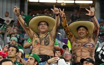 DOHA, QATAR - NOVEMBER 22: Mexican fans enjoy the pre match atmosphere prior to the FIFA World Cup Qatar 2022 Group C match between Mexico and Poland at Stadium 974 on November 22, 2022 in Doha, Qatar. (Photo by Claudio Villa/Getty Images)