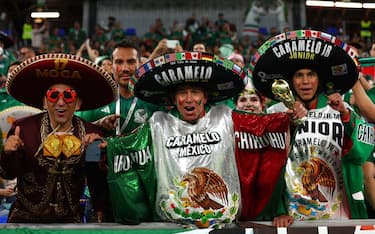 DOHA, QATAR - NOVEMBER 22:  Mexico fans show their support during the FIFA World Cup Qatar 2022 Group C match between Mexico and Poland at Stadium 974 on November 22, 2022 in Doha, Qatar. (Photo by Chris Brunskill/Fantasista/Getty Images)