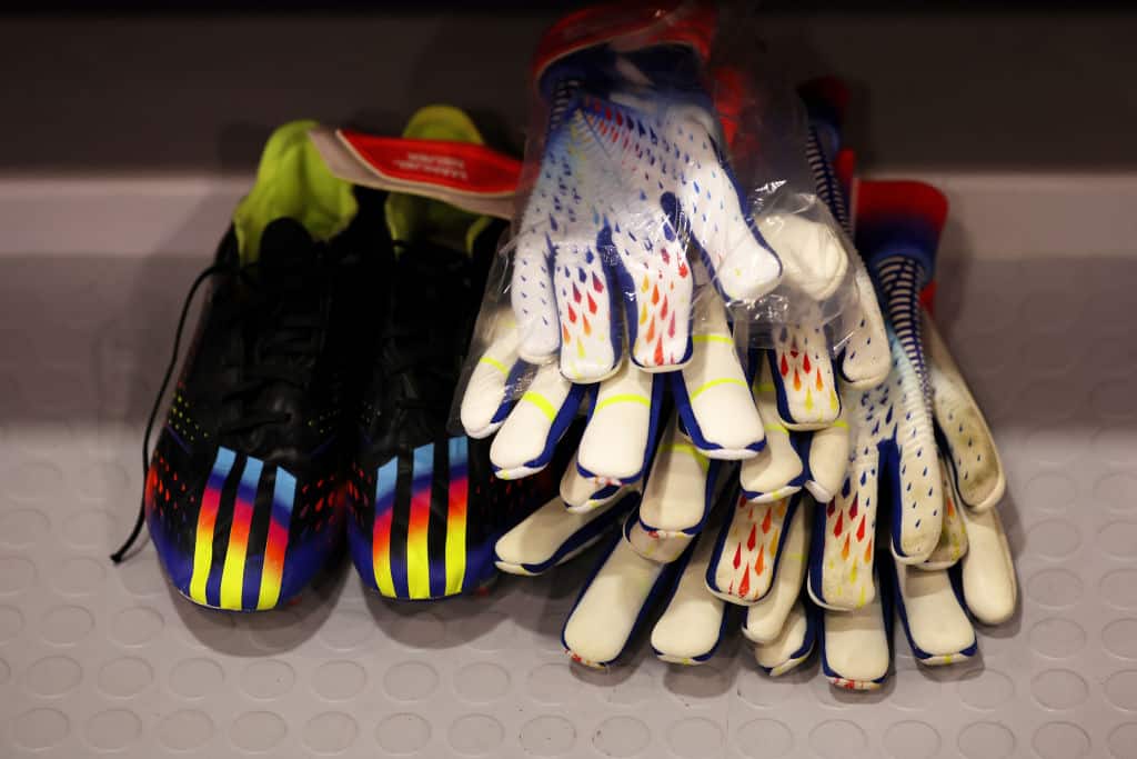 DOHA, QATAR - NOVEMBER 23: The goalkeeper gloves and boots worn by Manuel Neuer of Germany are displayed in the dressing room prior to the FIFA World Cup Qatar 2022 Group E match between Germany and Japan at Khalifa International Stadium on November 23, 2022 in Doha, Qatar. (Photo by Maja Hitij - FIFA/FIFA via Getty Images)