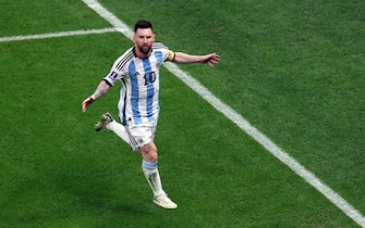 epa10364012 Lionel Messi of Argentina celebrates scoring the 1-0 by penalty during the FIFA World Cup 2022 semi final between Argentina and Croatia at Lusail Stadium in Lusail, Qatar, 13 December 2022.  EPA/Tolga Bozoglu