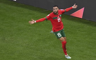 (221210) -- DOHA, Dec. 10, 2022 (Xinhua) -- Youssef En-Nesyri of Morocco celebrates scoring during the Quarterfinal between Morocco and Portugal of the 2022 FIFA World Cup at Al Thumama Stadium in Doha, Qatar, Dec. 10, 2022. (Xinhua/Li Jundong) - Li Jundong -//CHINENOUVELLE_CHINENOUVELLE1220/Credit:CHINE NOUVELLE/SIPA/2212101746/Credit:CHINE NOUVELLE/SIPA/2212101757
