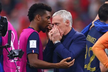 14 December 2022, Qatar, Al-Chaur: Soccer, World Cup 2022 in Qatar, France - Morocco, semifinal, France's coach Didier Deschamps (r) and France's Kingsley Coman after the match. Photo: Tom Weller/dpa