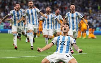 epaselect epa10358301 Lautaro Martinez of Argentina celebrates after scoring the decisive penalty during the penalty shoot-out of the FIFA World Cup 2022 quarter final soccer match between the Netherlands and Argentina at Lusail Stadium in Lusail, Qatar, 09 December 2022.  EPA/Mohamed Messara