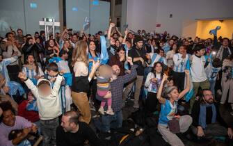 Argentine fans react during a soccer game between France and Argentina, the final of the FIFA 2022 World Cup, at 'The Football Village Brussels', organised at Autoworld car museum, in Brussels on Sunday 18 December 2022. BELGA PHOTO NICOLAS MAETERLINCK (Photo by NICOLAS MAETERLINCK / BELGA MAG / Belga via AFP) (Photo by NICOLAS MAETERLINCK/BELGA MAG/AFP via Getty Images)