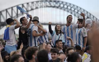 SYDNEY, AUSTRALIA - DECEMBER 19: Sydney fans celebrate following the FIFA World Cup Qatar 2022 soccer final match between France and Argentina at the Sydney Opera House in Sydney, Australia, on Monday, December 19, 2022. Lionel Messi's Argentina have won the World Cup in a penalty shootout after an amazing final with France ended in a 3-3 draw after extra-time in Qatar. (Photo by Stringer/Anadolu Agency via Getty Images)