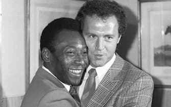 Retired Brazilian soccer star Pele (L) welcomes German soccer player Franz Beckenbauer (R) back to the New York Cosmos. Beckenbauer first signed with the Cosmos in 1977 and played with the team again in 1983.