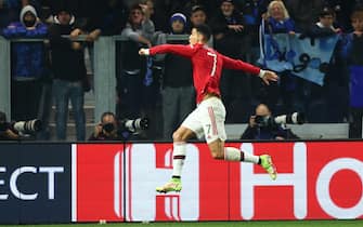 Manchester United's Cristiano Ronaldo celebrates after goal 1-1 during the UEFA Champions League group F soccer match between Atalanta BC and Manchester United at the Gewiss stadium in Bergamo, Italy, 2 November 2021. ANSA/PAOLO MAGNI
