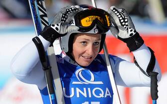 epa03052134 Elena Fanchini of Italy reacts in the finish area of the women's downhill race of the Alpine Skiing World Cup in Bad Kleinkirchheim, Austria, 07 January 2012.  EPA/HANS KLAUS TECHT