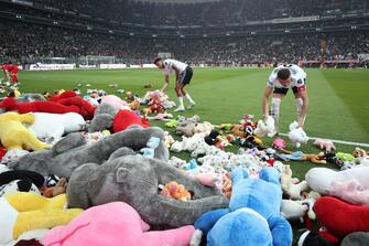 ISTANBUL, TURKIYE - FEBRUARY 26: Teddy bears and toys thrown on the field to be sent to the earthquake zone of the Vodafone Park Stadium prior to the Turkish Super Lig soccer match between Besiktas and Fraport TAV Antalyaspor, in Istanbul, Turkiye on February 26, 2023. On Feb.6 a strong 7.7 earthquake, centered in the Pazarcik district, jolted Kahramanmaras and strongly shook several provinces, including Gaziantep, Sanliurfa, Diyarbakir, Adana, Adiyaman, Malatya, Osmaniye, Hatay, and Kilis. On the same day at 1.24 p.m. (1024GMT), a 7.6 magnitude quake centered in Kahramanmaras' Elbistan district struck the region. (Photo by Ali Atmaca/Anadolu Agency via Getty Images)