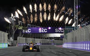 epa10532683 Mexican driver Sergio Perez of Red Bull Racing wins the Formula One Grand Prix of Saudi Arabia at the Jeddah Corniche Circuit, Saudi Arabia, 19 March 2023.  EPA/Luca Bruno / POOL