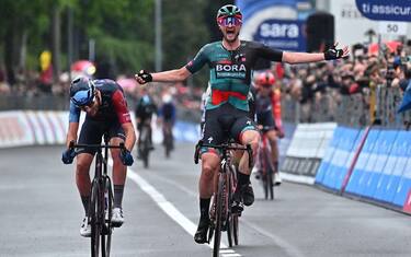 German rider Nico Denz of team Bora - Hansgrohe crosses the finish line and wins the fourteenth stage of the 2023 Giro d'Italia cycling race over 193 km from Sierre to Cassano Magnago, Swiss, 20 May 2023. ANSA/LUCA ZENNARO