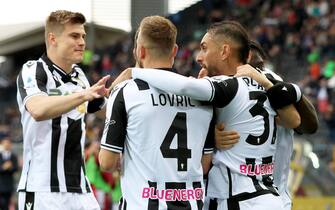 Udinese's Roberto Pereyra (L) jubilates with his teammates after scoring the goal during the Italian Serie A soccer match Udinese Calcio vs UC Sampdoria at the Friuli - Dacia Arena stadium in Udine, Italy, 8 May 2023. ANSA / GABRIELE MENIS