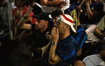 FC Inter s supporters shows their dejection at the end of the UEFA Champions League Final soccer match Manchester City FC vs FC Inter (that was played at the Ataturk Olympic stadium in Istanbul, Turkey), in Milan, Italy, 10 June 2023. 
ANSA/DAVIDE CANELLA
(tifosi / delusione / sconfitta)