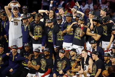 epa10687819 The Denver Nuggets pose for a team photo after defeating the Miami Heat in game five of the NBA Finals at Ball Arena in Denver, Colorado, USA, 12 June 2023. The Nuggets are NBA Champions for the first time in their franchise history  EPA/JOHN G. MABANGLO  SHUTTERSTOCK OUT