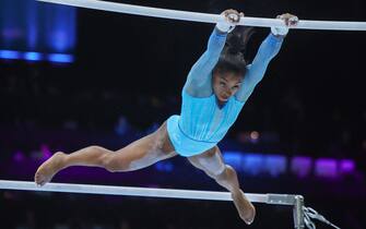 epa10894318 Simone Biles of the US performs during the Uneven Bars competition qualifications of the Artistic Gymnastics World Championships in Antwerp, Belgium, 01 October 2023.  EPA/OLIVIER MATTHYS