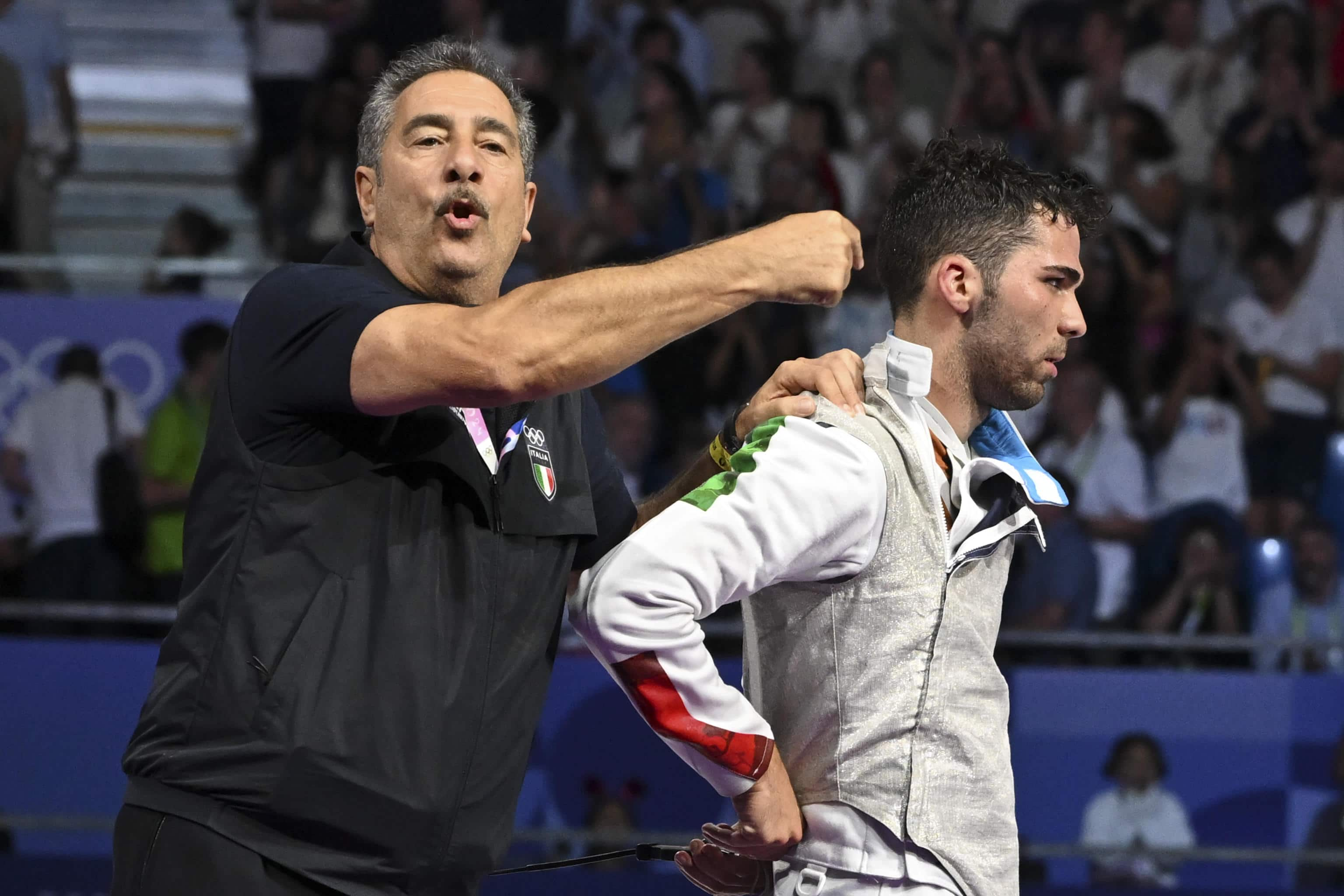 Italy's Filippo Macchi reacts after losing to Hong Kong's Cheung Ka Long in the men's foil individual gold medal bout during the Paris 2024 Olympic Games at the Grand Palais in Paris, France, 29 July 2024.
ANSA/ CIRO FUSCO