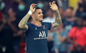epa09414104 Paris Saint Germain's Mauro Icardi reacts after scoring the first goal during the French Ligue 1 soccer match between Paris Saint Germain and Strasbourg at the Parc des Princes stadium in Paris, France, 14 August 2021.  EPA/Christophe Petit Tesson