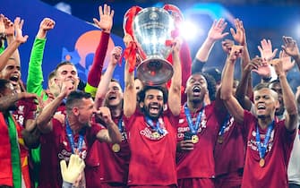 BAKU, AZERBAIJAN - MAY 29: Mohamed Salah of Liverpool celebrates with the Champions League Trophy after winning the UEFA Champions League Final between Tottenham Hotspur and Liverpool at Estadio Wanda Metropolitano on June 01, 2019 in Madrid, Spain. (Photo by Michael Regan/Getty Images)