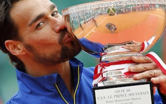 epa07520048 Fabio Fognini of Italy poses with his trophy after winning against Dusan Lajovic of Serbia in their final match of the Monte-Carlo Rolex Masters tournament in Roquebrune Cap Martin, France, 21 April 2019.  EPA/SEBASTIEN NOGIER