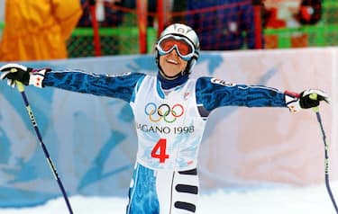 Italy's Deborah Compagnoni raises her arms in victory after winning the Olympic Women's Giant Slalom at Mt. Higashidate in Shigakogen 20 February. Compagnoni went into the Olympic record books after winning her third gold medal in three straight Winter Games.    ANSA/STEPHEN JANSEN