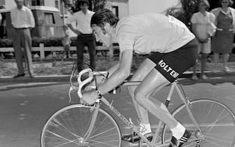 161858729 Belgian cyclist Eddy Merckx rides during the 20th and final stage of the Tour de France, an individual time trial between Versailles and Paris 18 July 1971. Merckx wins the stage along with his third consecutive Tour de France. (Photo credit should read /AFP via Getty Images)