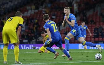 Ukraine's forward Artem Dovbyk (R) celebrates after scoring his team's second goal during the UEFA EURO 2020 round of 16 football match between Sweden and Ukraine at Hampden Park in Glasgow on June 29, 2021. (Photo by Robert Perry / POOL / AFP) (Photo by ROBERT PERRY/POOL/AFP via Getty Images)