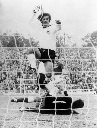 West Germany's Gerd Muller leaps over USSR goalkeeper Yevgen Rudakov after touching home his team's third goal  (Photo by S&G/PA Images via Getty Images)