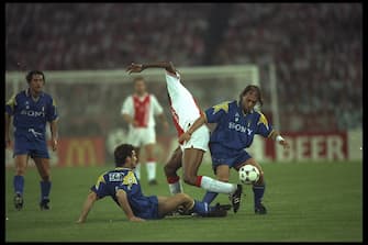 23 May 1996:  Antonio Conte and Ciro Ferrera of Juventus challenge Nwankwo Kanu of Ajax during the European Cup Final in Amsterdam, Netherlands. The game went to penaltys after full time the score was 1-1 and Juventus won the penaltys 4-2. \  \ Mandatory Credit: Shaun Botterill /Allsport
