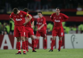 ISTANBUL, TURKEY - MAY 25:  Liverpool captain Steven Gerrard (L), Liverpool midfielder Xabi Alonso of Spain (C) and Liverpool defender Jamie Carragher (R) react during the European Champions League final between Liverpool and AC Milan on May 25, 2005 at the Ataturk Olympic Stadium in Istanbul, Turkey.  (Photo by Clive Brunskill/Getty Images)
