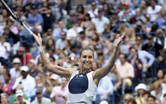 epa04990647 YEARENDER 2015 SEPTEMBER
Flavia Pennetta of Italy reacts after defeating Roberta Vinci of Italy in the women's final on the thirteenth day of the 2015 US Open Tennis Championship at the USTA National Tennis Center in Flushing Meadows, New York, USA, 12 September 2015.  EPA/JOHN G. MABANGLO
