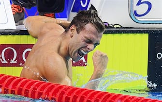 epa06117817 Gregorio Paltrinieri of Italy celebrates after winning the men's 1,500m Freestyle final during the 17th FINA Swimming World Championships in the Duna Arena in Budapest, Hungary, 30 July 2017.  EPA/TAMAS KOVACS HUNGARY OUT