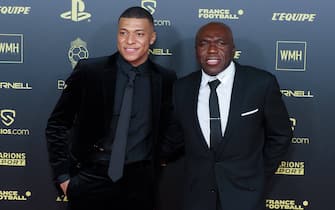 Kylian Mbappe and his father Wilfried Mbappe
attending the Ballon D'Or photocall at Theatre du Chatelet on November 29, 2021 in Paris, France.