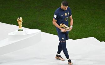 Kylian Mbappé of France is seen as he collects his Golden Boot award after the FIFA World Cup Qatar 2022 Final match between Argentina and France at Lusail Stadium on December 18, 2022. Photo by Laurent Zabulon/ABACAPRESS.COM