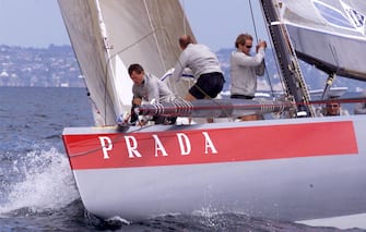 AUC10D:SPORT-YACHTING-AMERICAS:AUCKLAND,NEWZEALAND,18OCT99 - Italian team Prada Challenge crew work on the bow as they pull out to a comfortable lead on their way to beating Swiss Fast 2000 on day one of Round Robin One in the Louis Vuitton Cup. The outcome of the Cup will decide who will race New Zealand for the America's Cup.     nm/Photo by Nigel Marple       REUTERS