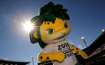 BLOEMFONTEIN, SOUTH AFRICA - JUNE 20: World Cup mascot Zakumi entertains the crowds prior to the 2010 FIFA World Cup South Africa Group F match between Slovakia and Paraguay at the Free State Stadium on June 20, 2010 in Mangaung/Bloemfontein, South Africa.  (Photo by Clive Mason/Getty Images)
