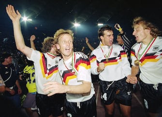 Rudi Voeller, Andreas Brehme, Juergen Kohler, Bodo Illgner and Juergen Klinsmann of Germany celebrate their defeat of Argentina in the 1990 FIFA World Cup Final on 8 July 1990 at the Olimpico Stadium in Rome, Italy. The match resulted in a 1-0 victory for Germany.(Photo by David Cannon/Getty Images) 