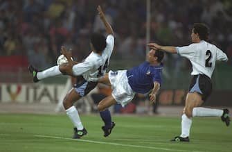 25 Jun 1990:  Salvatore Schillaci (centre) of Italy tries to score during the World  Cup match against Uraguay in Rome. Italy won the match 2-0. \ Mandatory Credit: David  Cannon/Allsport