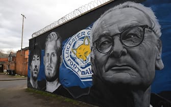 A giant mural created by artist Richard Wilson, depicts Leicester City's former Italian manager Claudio Ranieri, (R), Leicester City's Japanese striker Shinji Okazaki (L) and Leicester City's Danish goalkeeper Kasper Schmeichel in Leicester, central England on May 7, 2016.in Leicester, central England on March 13, 2017.
Leicester City are set to play Sevilla in a UEFA Champions League Round of 16 second leg football match on March 14.  / AFP PHOTO / Paul ELLIS / RESTRICTED TO EDITORIAL USE - MANDATORY MENTION OF THE ARTIST UPON PUBLICATION - TO ILLUSTRATE THE EVENT AS SPECIFIED IN THE CAPTION        (Photo credit should read PAUL ELLIS/AFP via Getty Images)