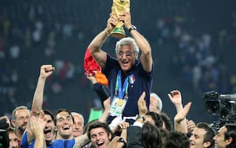 Italian national coach Marcello Lippi celebrates with the World Cup Trophy in his hands at the end of the final of the 2006 FIFA World Cup between Italy and France at the Olympic Stadium in Berlin, Germany, Sunday 09 July 2006. 
ANSA/Kay Nietfeld