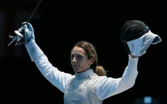 FENCING epa03322823 Valentina Vezzali of Italy celebrates her victory over Hee Hyun Nam of Korea following their Bronze medal fight at the Women's Foil Individuals competition during the London 2012 Olympic Games. in London, Britain, 28 July 2012 EPA/SERGEI ILNITSKY
