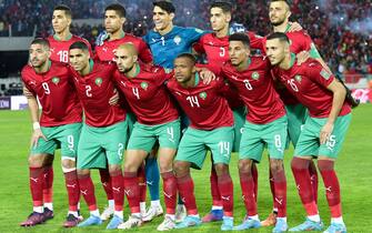 Morocco's players pose for a group picture ahead of the second leg of the 2022 Qatar World Cup African Qualifiers football match between Morocco and DR Congo at the Mohamed V Stadium in the city of Casablanca on March 29, 2022. (Photo by AFP) (Photo by -/AFP via Getty Images)