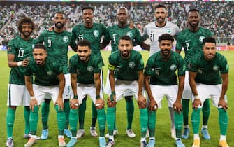 Saudi's players pose for a group photo ahead of the 2022 Qatar World Cup Asian Qualifiers football match between Saudi Arabia and Australia, at the King Abdullah Sport City Stadium in the city of Jeddah, on March 29, 2022. (Photo by AFP) (Photo by -/AFP via Getty Images)
