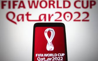UKRAINE - 2021/11/20: In this photo illustration, FIFA World Cup Qatar 2022 logo is seen on a smartphone screen. (Photo Illustration by Pavlo Gonchar/SOPA Images/LightRocket via Getty Images)