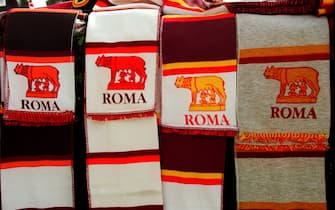 Roma scarves for sale outside the Olympic Stadium  (Photo by Matthew Ashton/EMPICS via Getty Images)