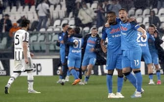 TURIN, ITALY - APRIL 23: Juan Jesus (C) and Amir Rrahmani (R) of Napoli celebrate as Manuel Locatelli (L) of Juventus, leaves the pitch at the end of the Italian Serie A football match between Juventus and Napoli at the Allianz Stadium in Turin, Italy, on April 23, 2023. Napoli defeated Juventus 1-0. (Photo by Riccardo De Luca/Anadolu Agency via Getty Images)