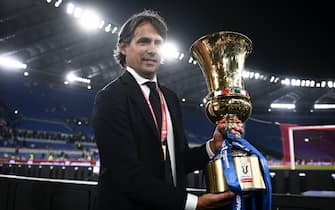 STADIO OLIMPICO, ROME, ITALY - 2022/05/12: Simone Inzaghi, head coach of FC Internazionale, poses with the trophy during the award ceremony at the end of the Coppa Italia final football match between Juventus FC and FC Internazionale. FC Internazionale won 4-2 over Juventus FC after extra time. (Photo by Nicolò Campo/LightRocket via Getty Images)
